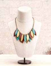 Necklace with wooden and metallic leaves