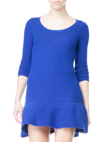 Vestido punto bajo volante