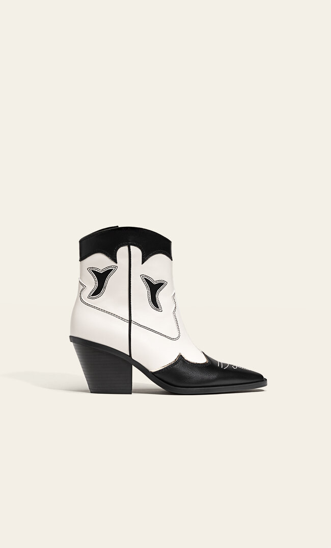 Stradivarius Stiefeletten Im Cowboylook Mit Fantasiemotiven Kombiniert 39
Stradivarius Stiefeletten Im Cowboylook Mit Fantasiemotiven Kombiniert 39
