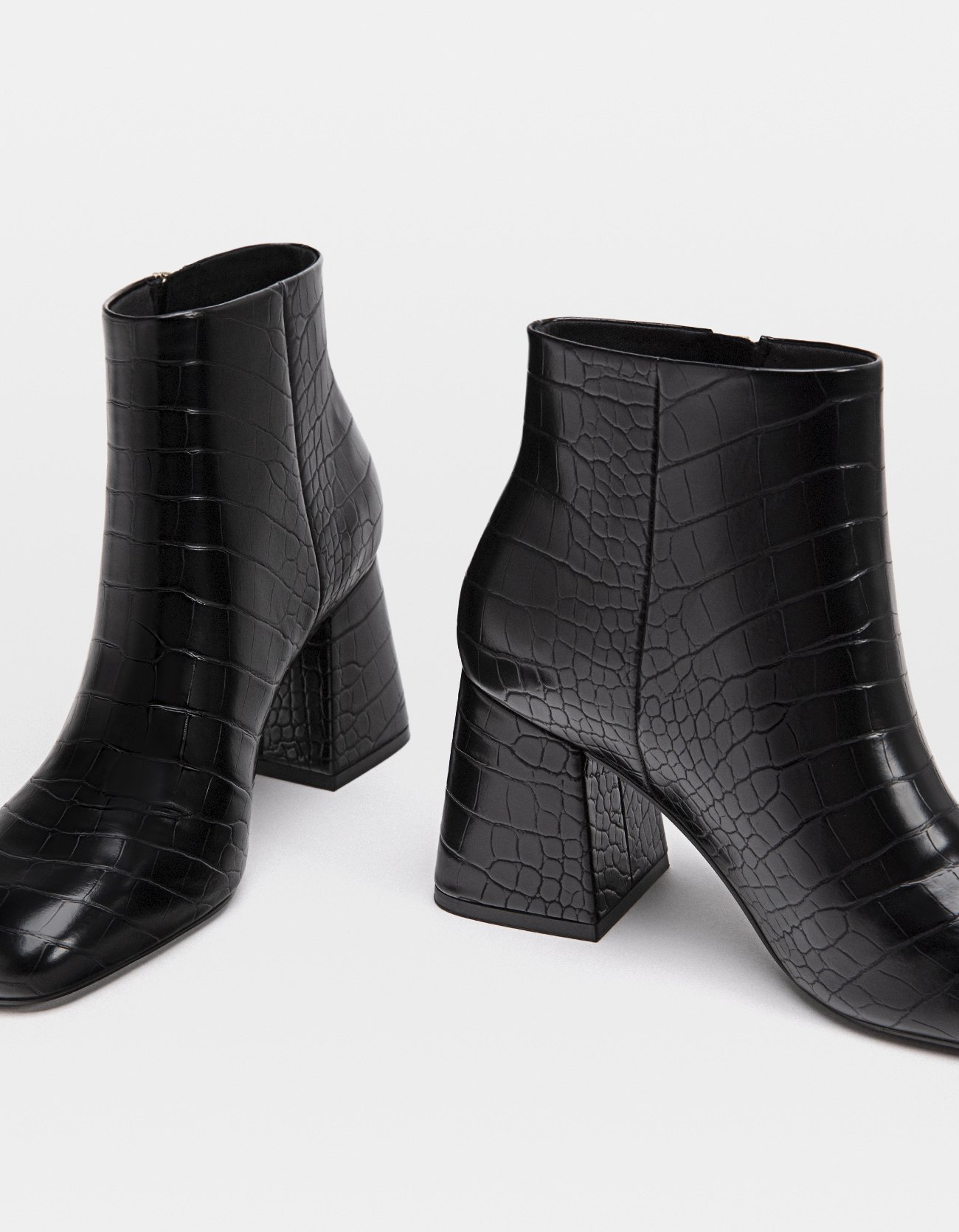 black embossed high heel ankle boots
