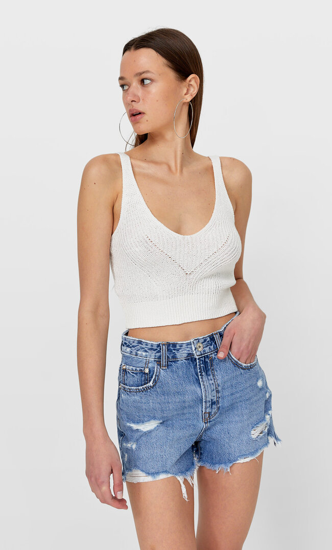 

Stradivarius Jeansowe Spodenki Z Przetarciami Średniodenimowy 42