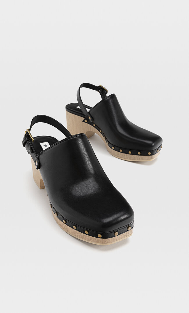 

Stradivarius Clogs Mit Absatz In Holzoptik Und Nieten Schwarz 37