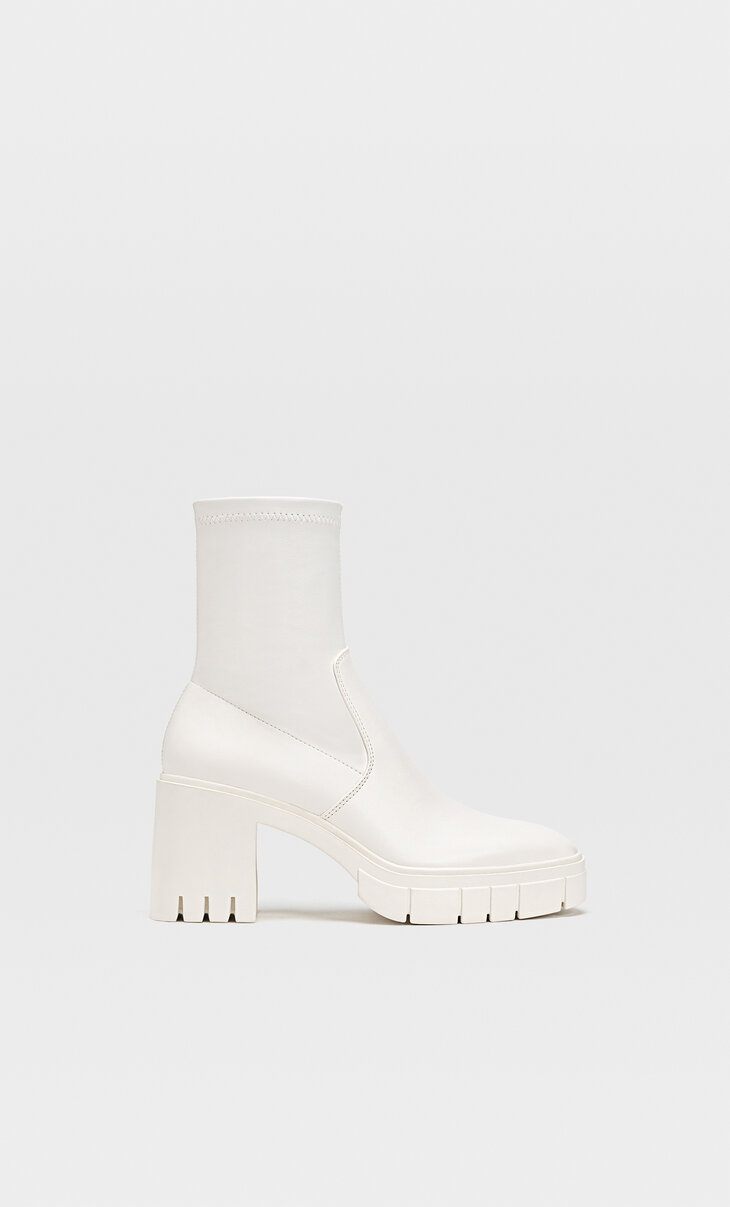 Track sole heeled ankle boots