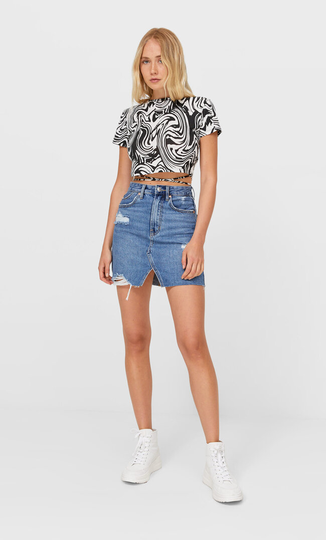 

Stradivarius Mini-Jeansrock Im Acid-Wash Mittleres Denim 34