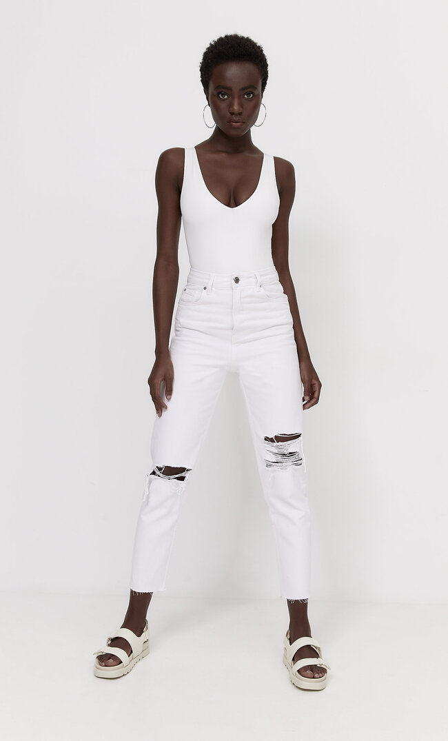 

Stradivarius Jeansy Mom Fit Z Przetarciami Kobieta Biały 34