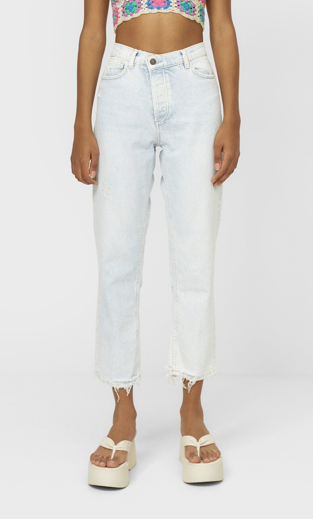 Mom jeans with asymmetric waistband