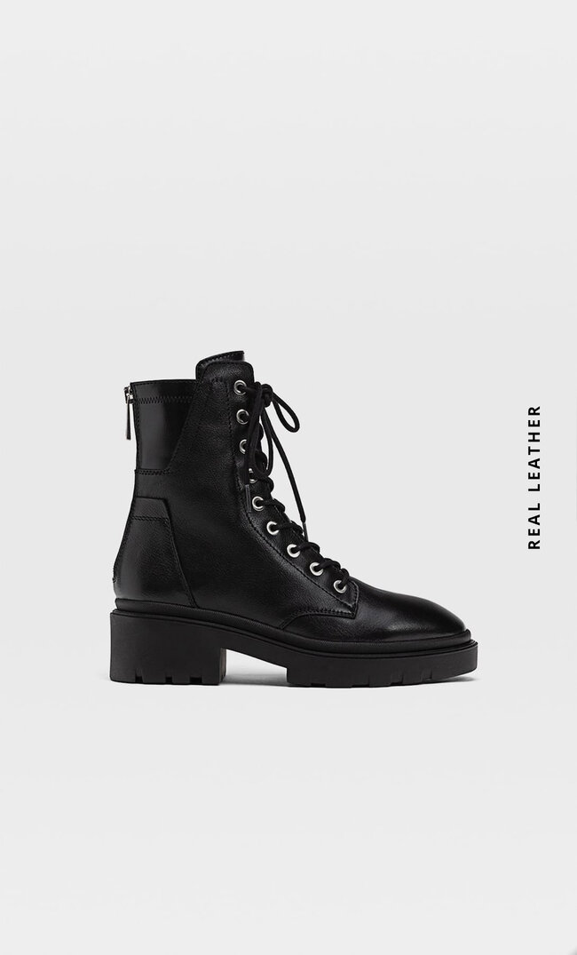 

Stradivarius Flache Stiefeletten Aus Leder Mit Reißverschluss Schwarz 39
