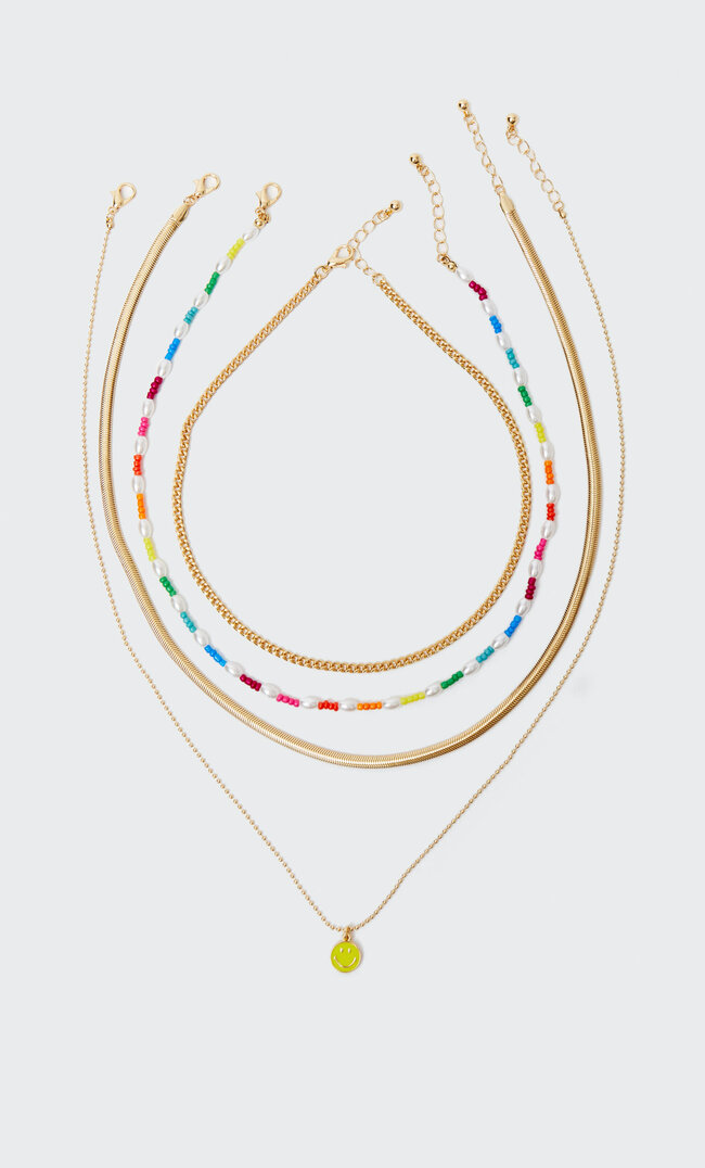 

Stradivarius 4er-Set Halsketten Mit Perlenbesatz Smiley® Gelb M