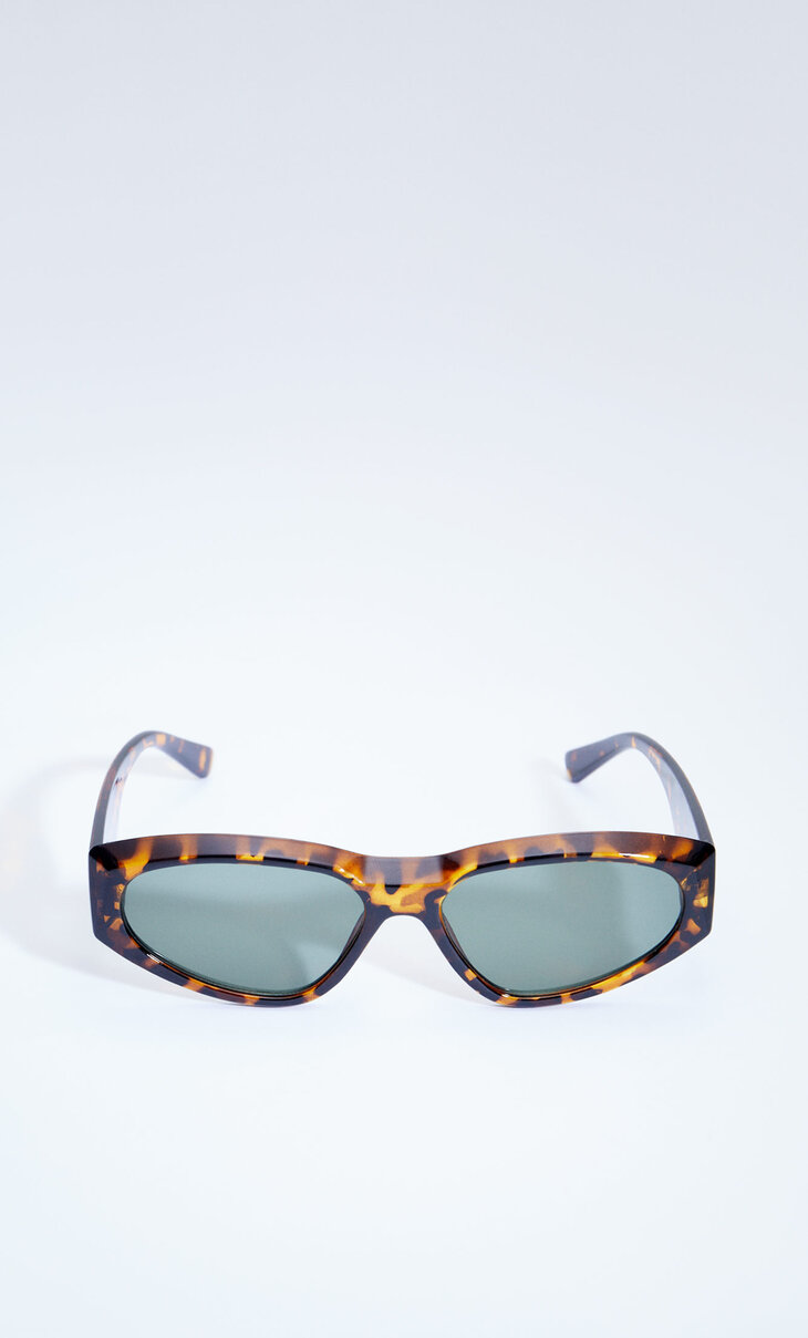 Овальные солнцезащитные очки “кошачий глаз”