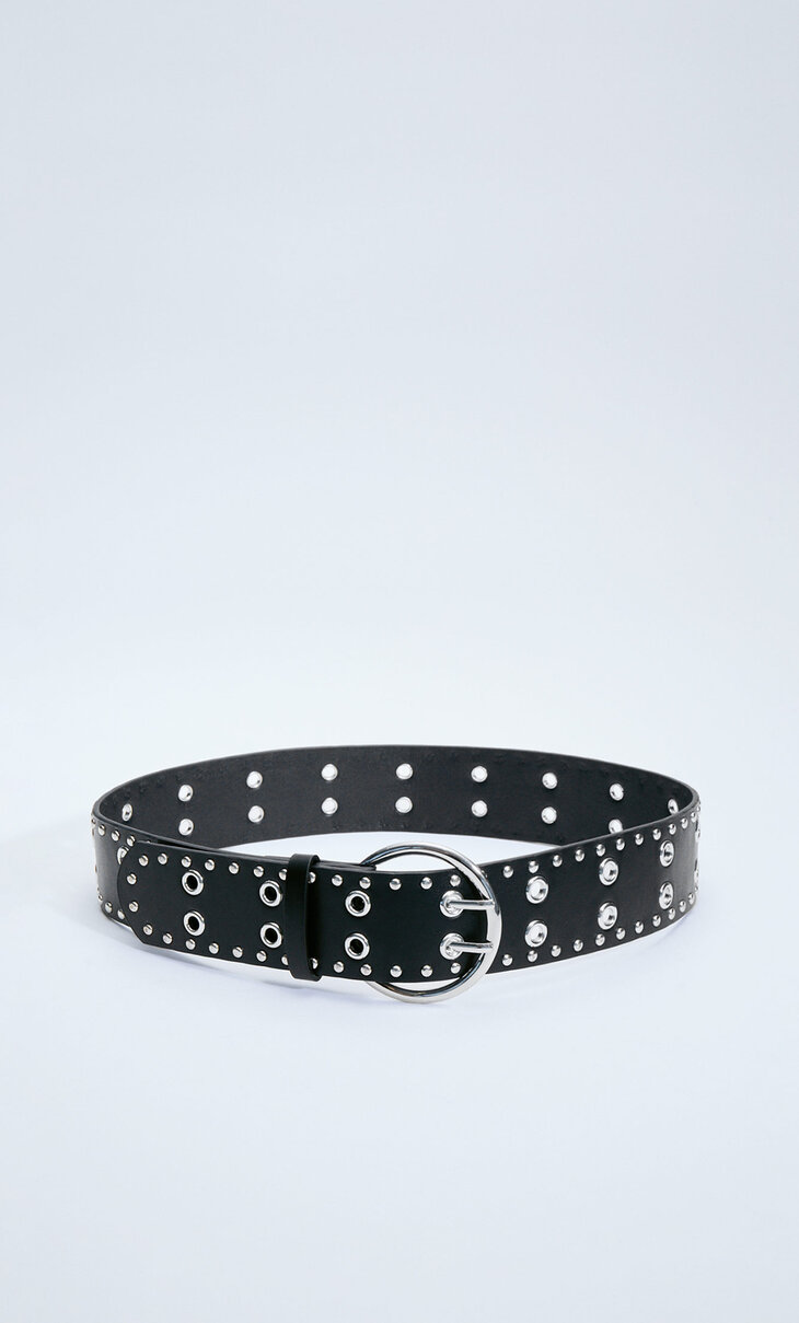 Wide belt with studs and eyelets