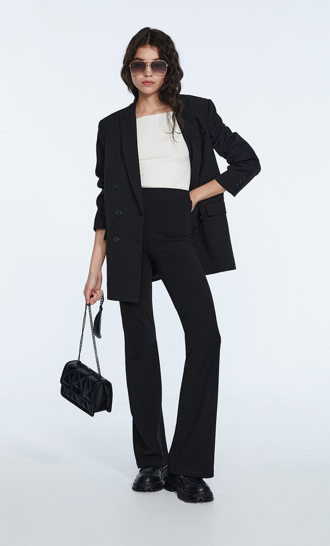 

Stradivarius Pantalon Flare Maille Uni Noir S