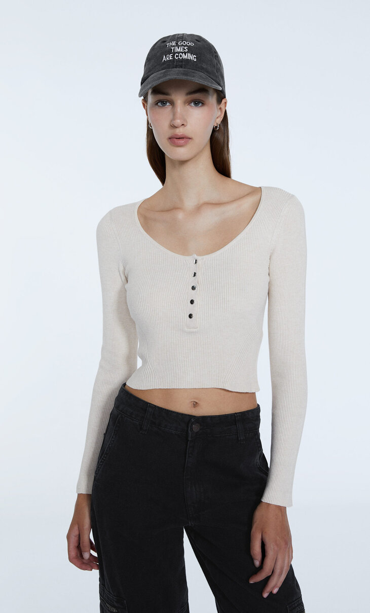 Pull maille boutons-pression