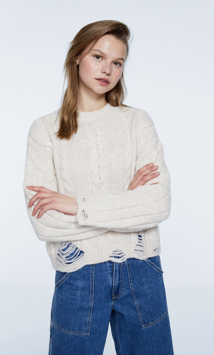 Sweater with ripped hem