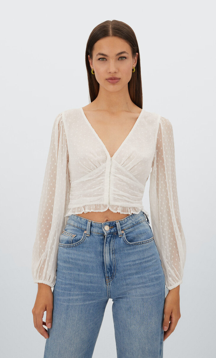 Blouse with hook-and-eye clasps