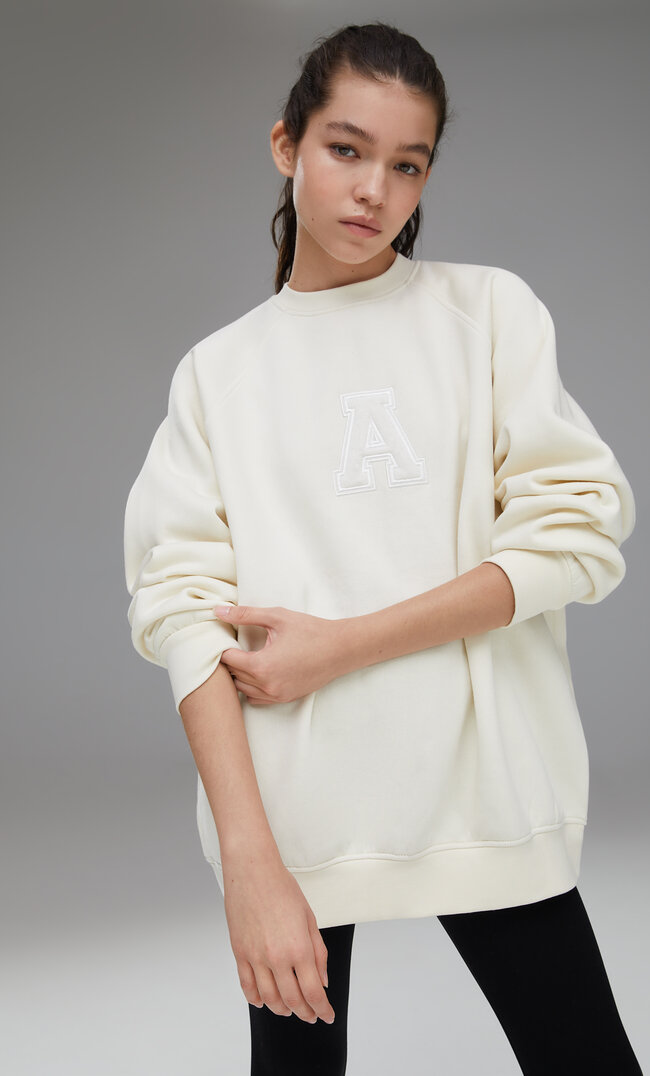 

Stradivarius Sport-Sweatshirt Mit Aufnäher Ecru Xl