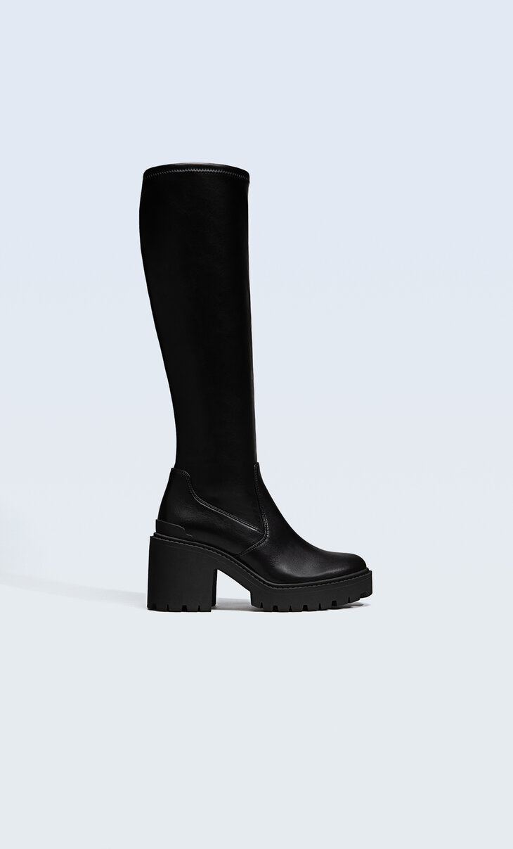 Track sole heeled boots