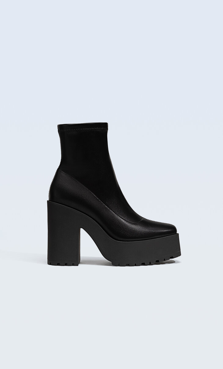 High-heel platform ankle boots with track sole