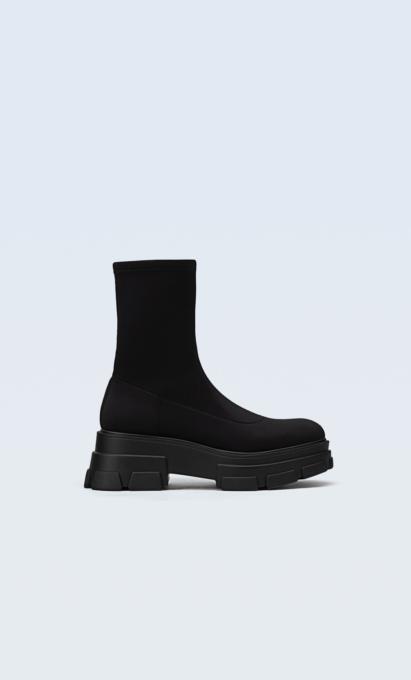 Flat ankle boots with track soles 