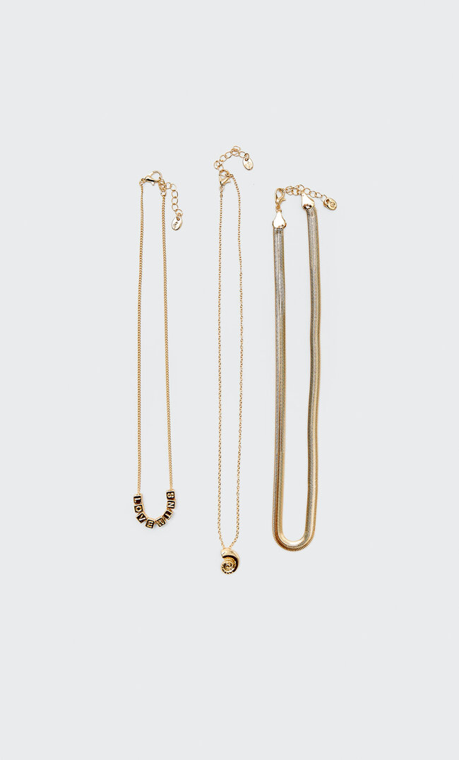

Stradivarius 3er-Set Halsketten Mit Slogan Und Meeresschnecke Gelb M