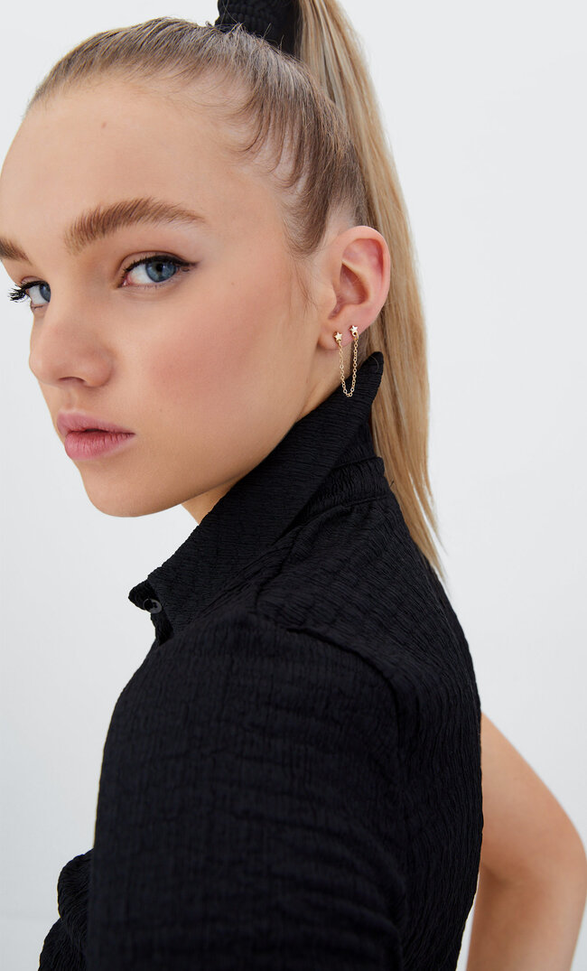 

Stradivarius Set Cosmic Earcuff Gelb M
