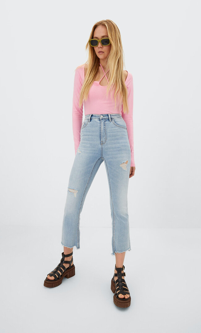 

Stradivarius Cropped-Schlaghose Gebleichtes Denim 34