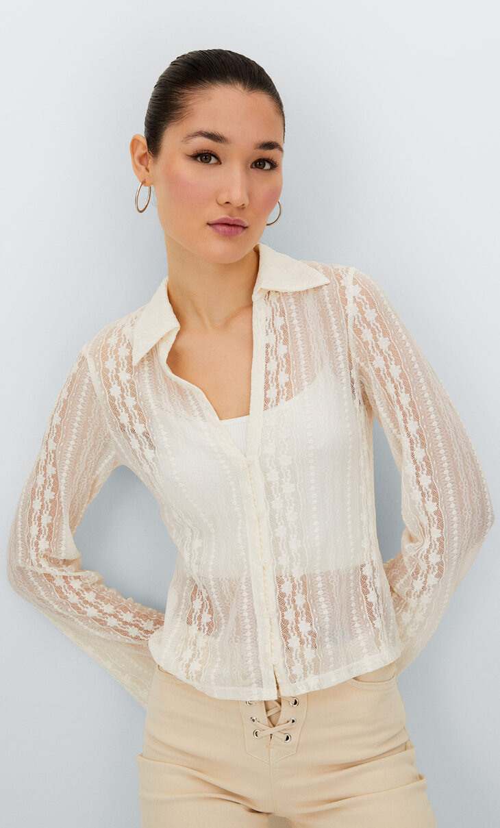 Tricot blouse met kant