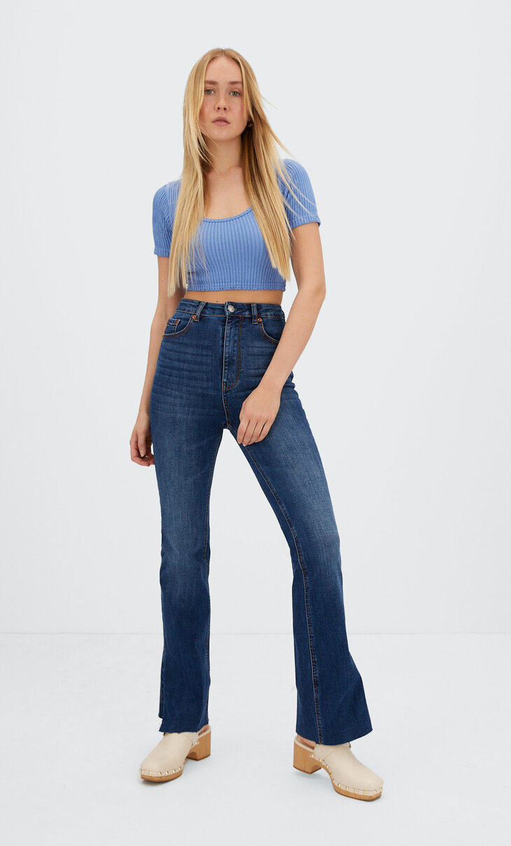 Slim flared jeans with slit