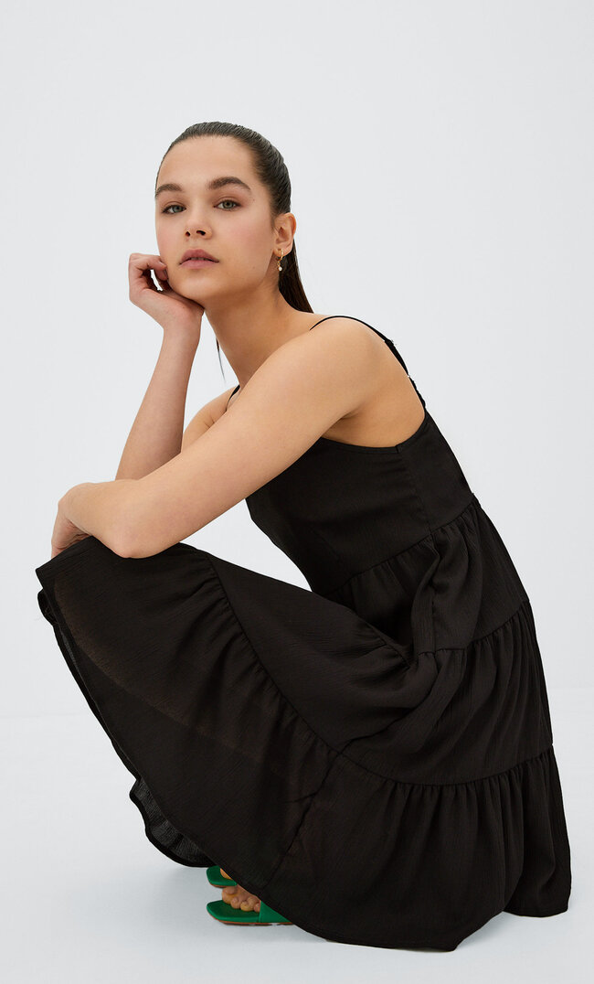 

Stradivarius Kurzes Trägerkleid Schwarz M