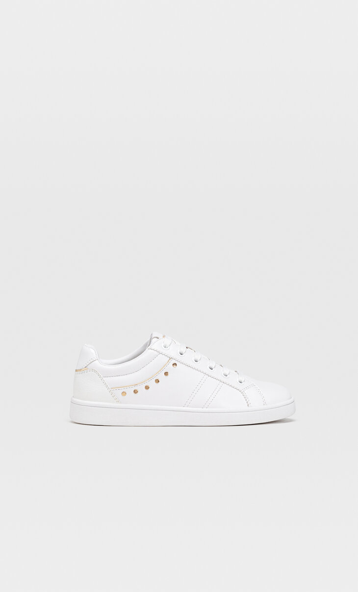 White trainers with studded detail