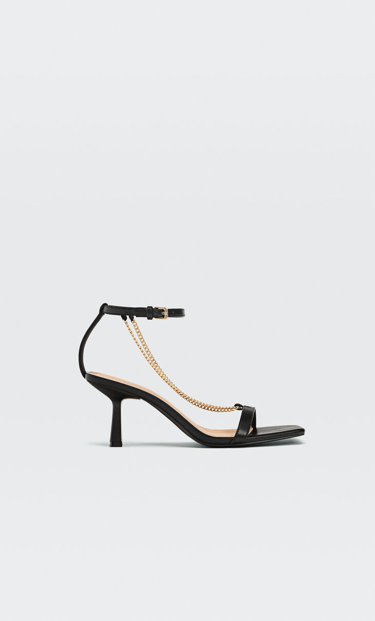 Stiletto heel sandals with chain