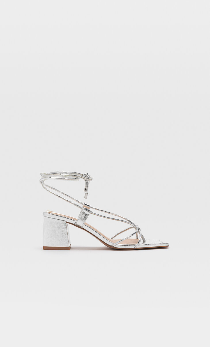 Heeled sandals with tied straps