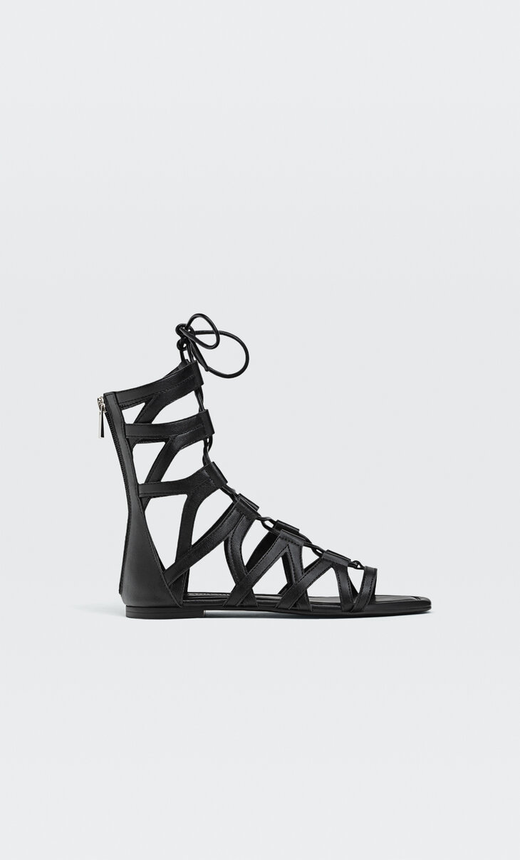 Flat sandals with multiple straps