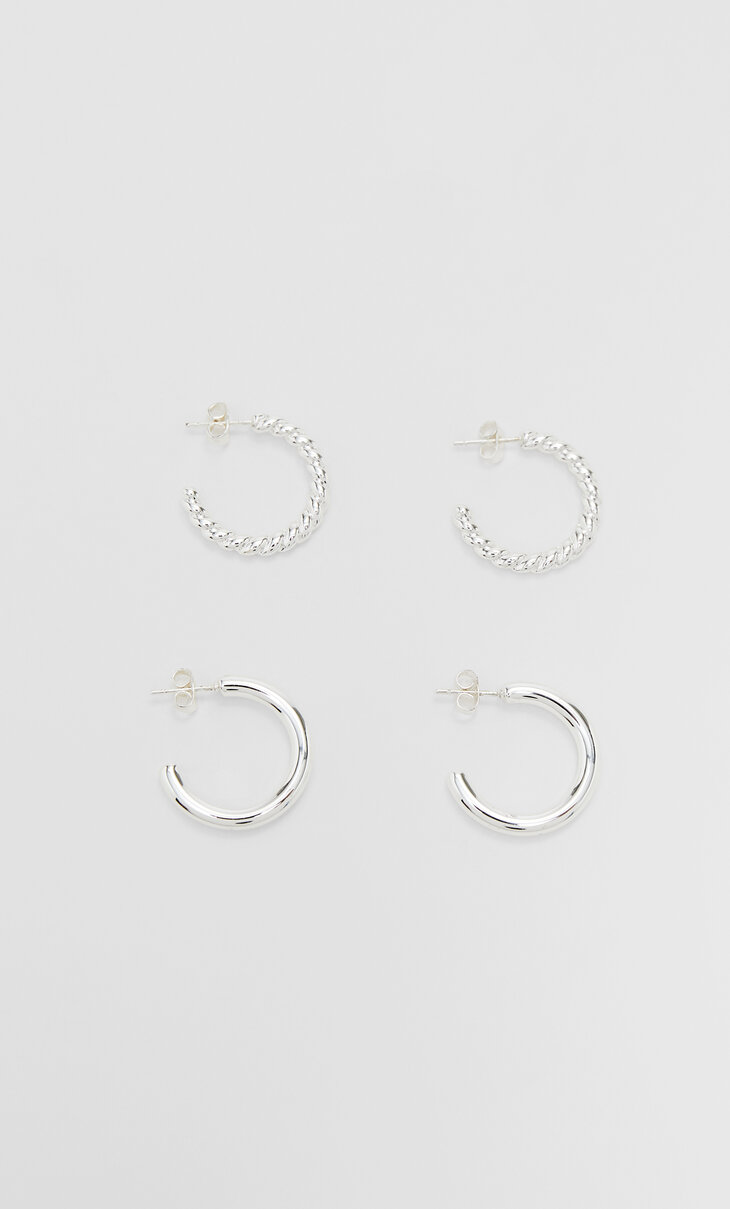 Set of 2 pairs of textured hoop earrings. Gold/Silver plated.