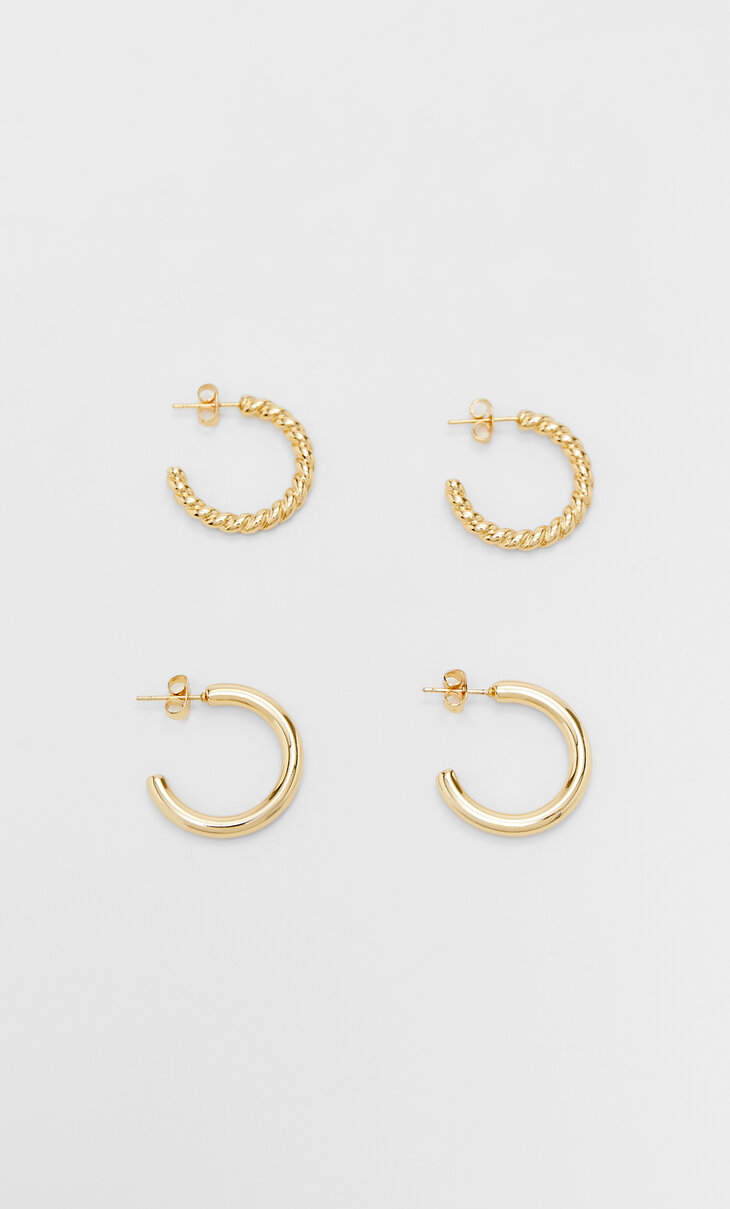 Set of 2 pairs of textured hoop earrings. Gold/Silver plated.
