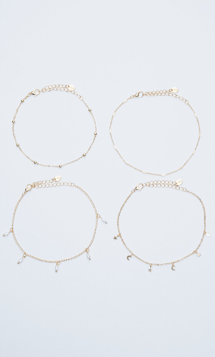Set of 4 charm and pearl bead anklets