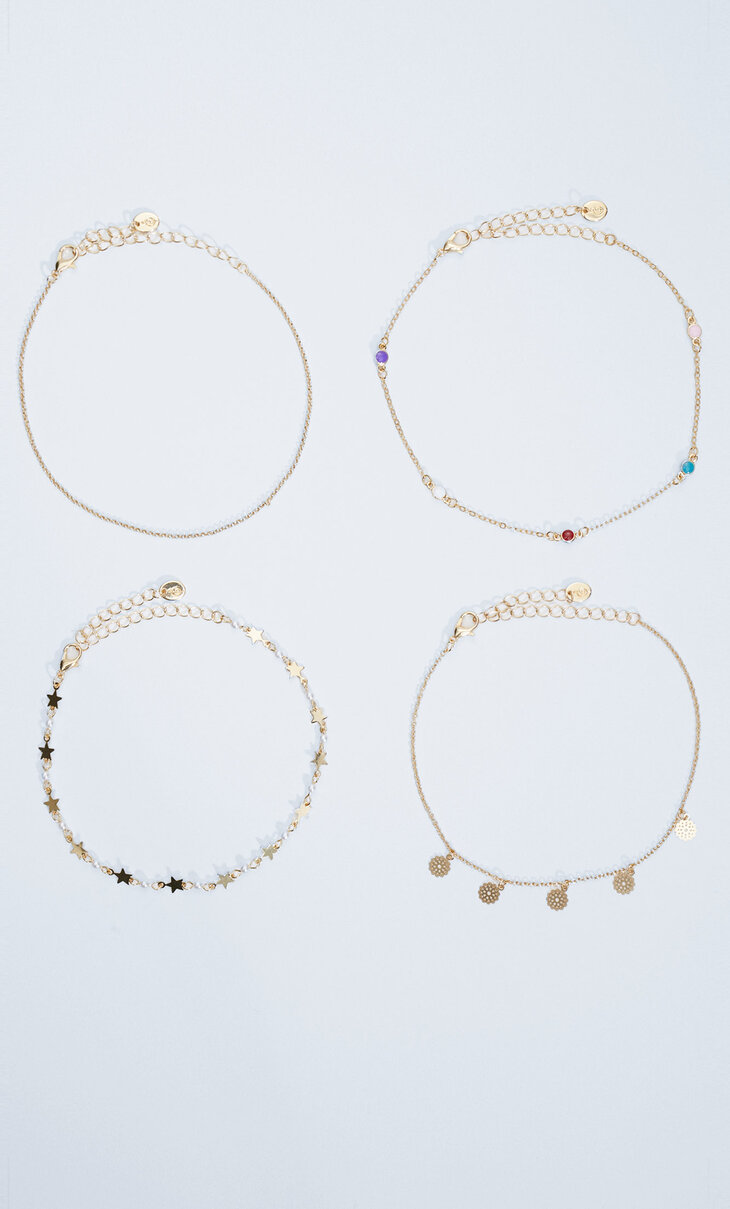 Set of 4 anklets with moon and stars