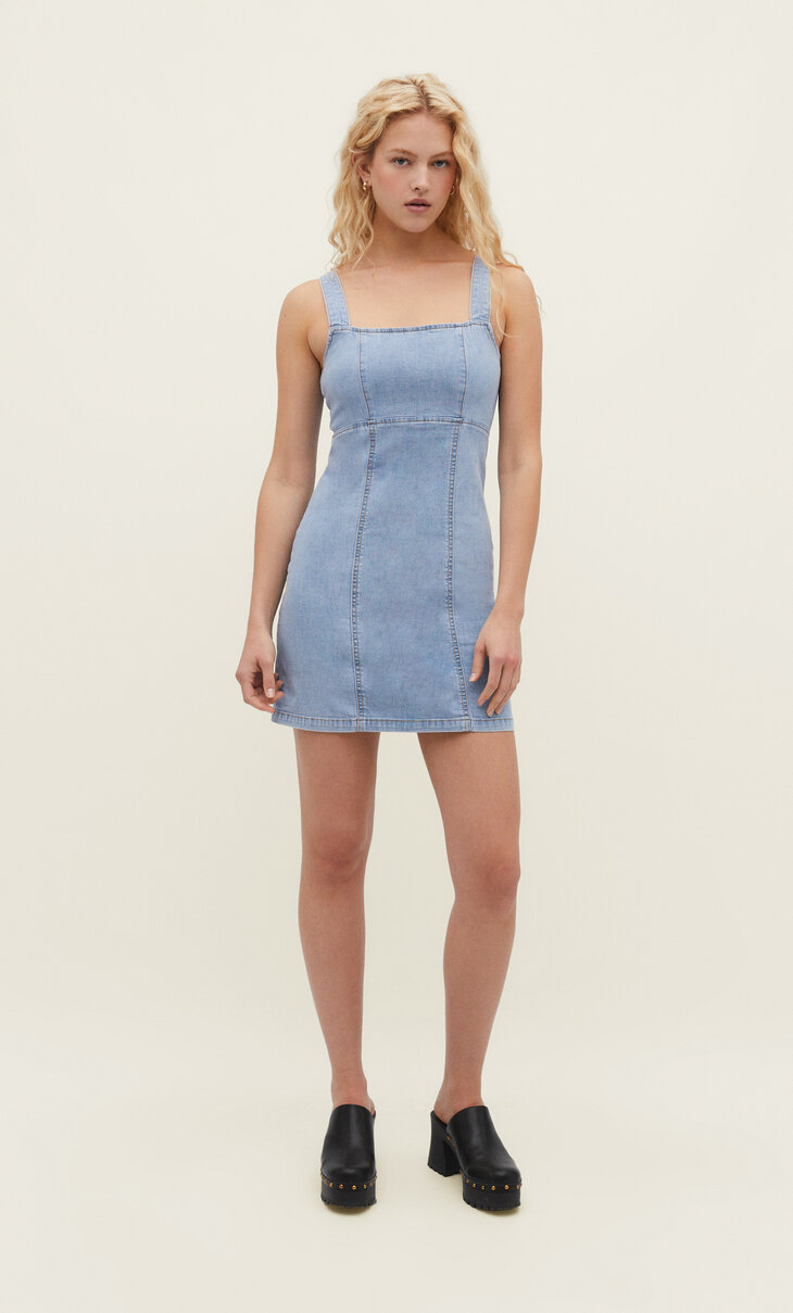 Short denim dress with ties at the back