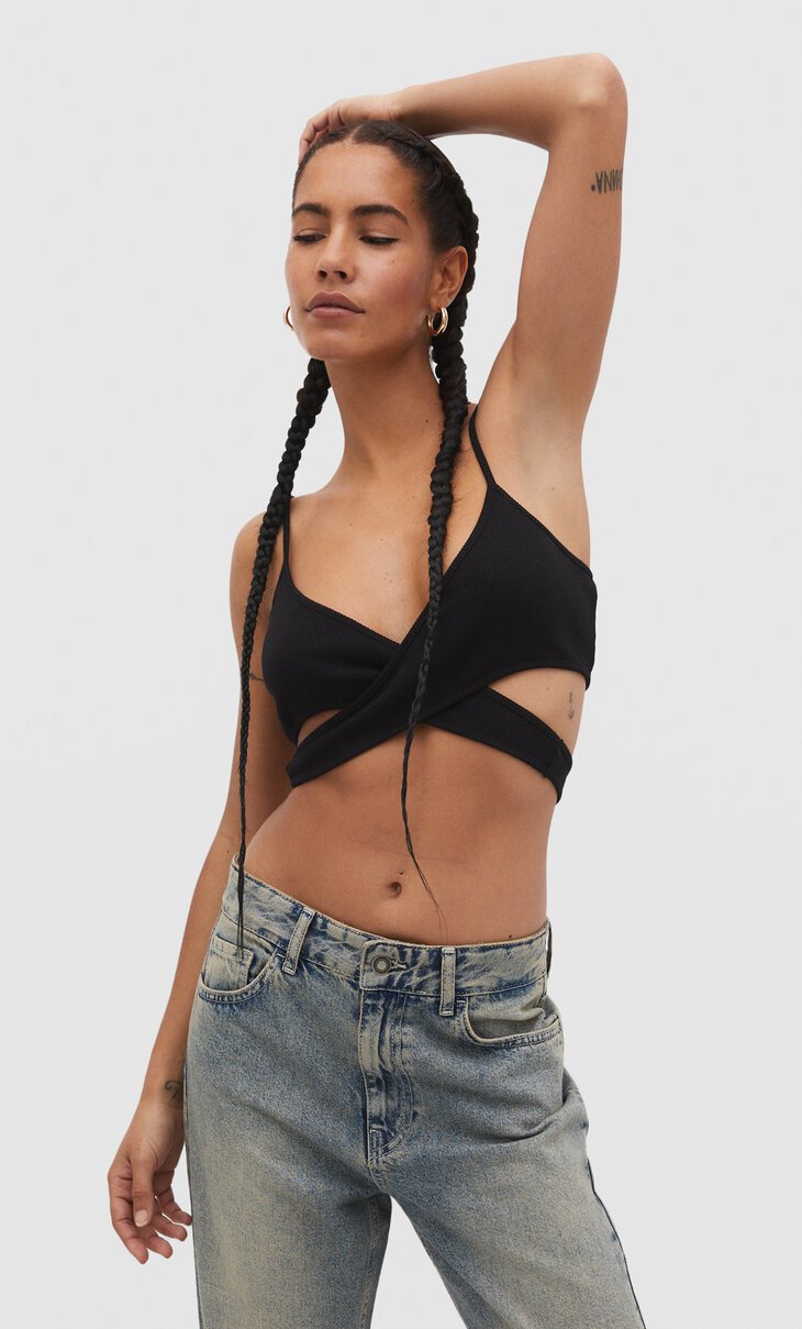 Strappy top with side cut-out detail