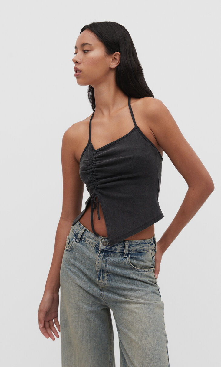 Asymmetric halter neck top with gathered sides