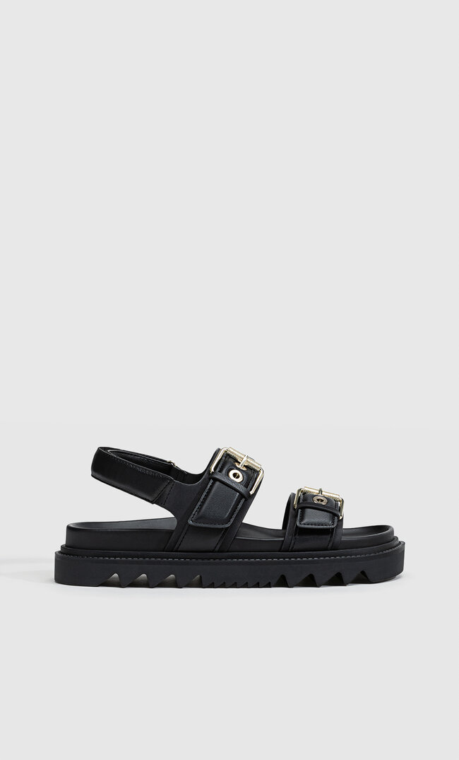 

Stradivarius flache sandalen mit Profilsohle und Schnallen SCHWARZ 35