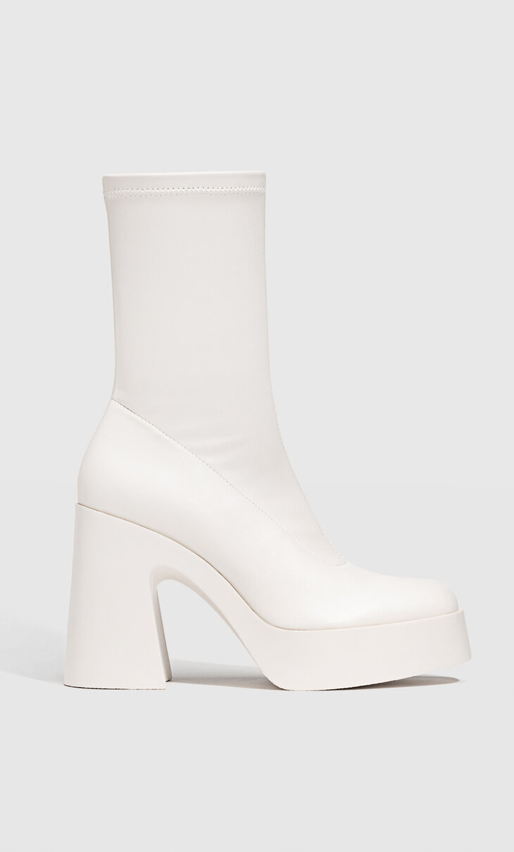 High-heel platform ankle boots with track sole