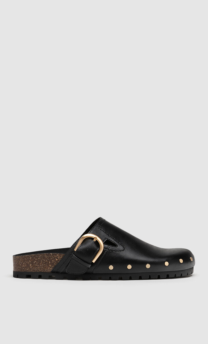 Black clogs with buckle details