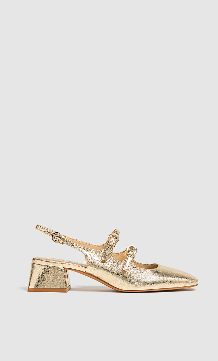 Gold high-heel slingback ballerina-style shoes