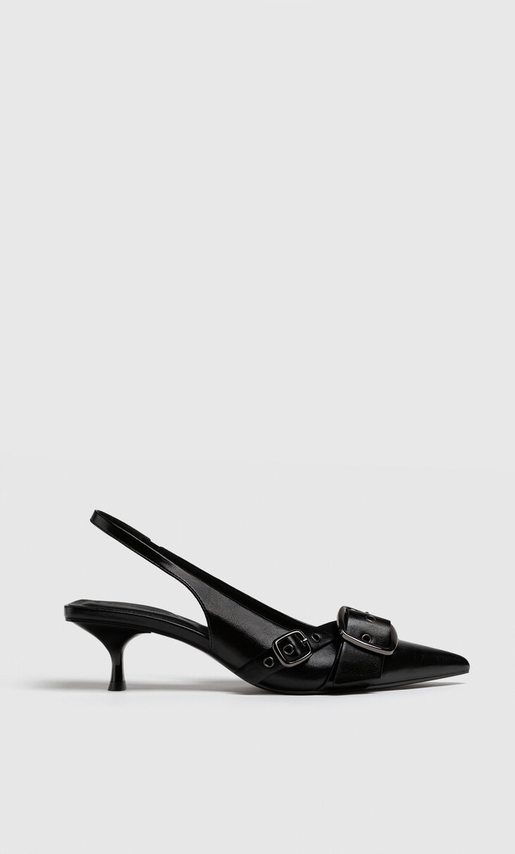 Black heeled buckled shoes