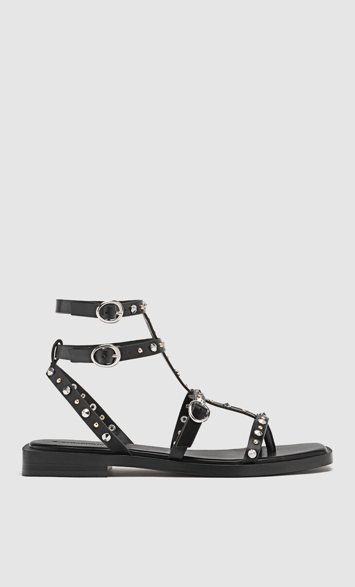 Black flat sandals with studs