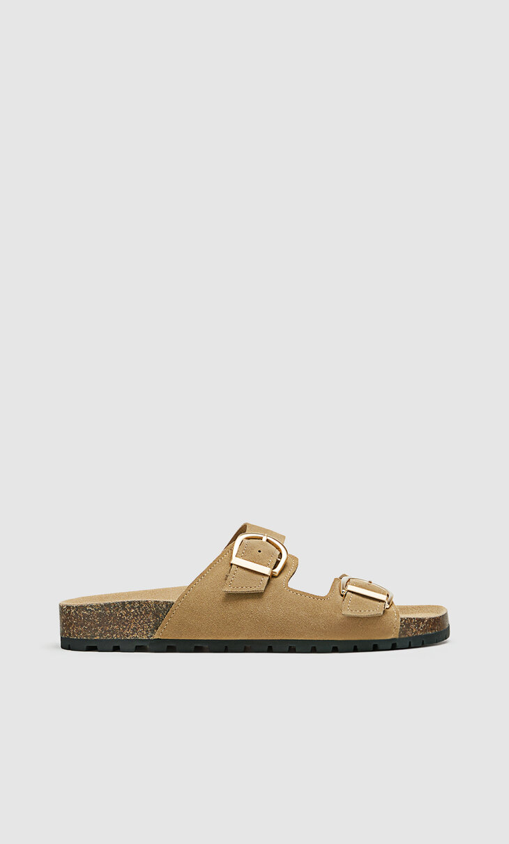 Flat leather sandals with buckles