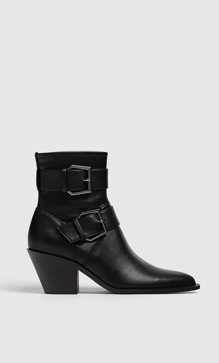 Black high-heel ankle boots with buckles