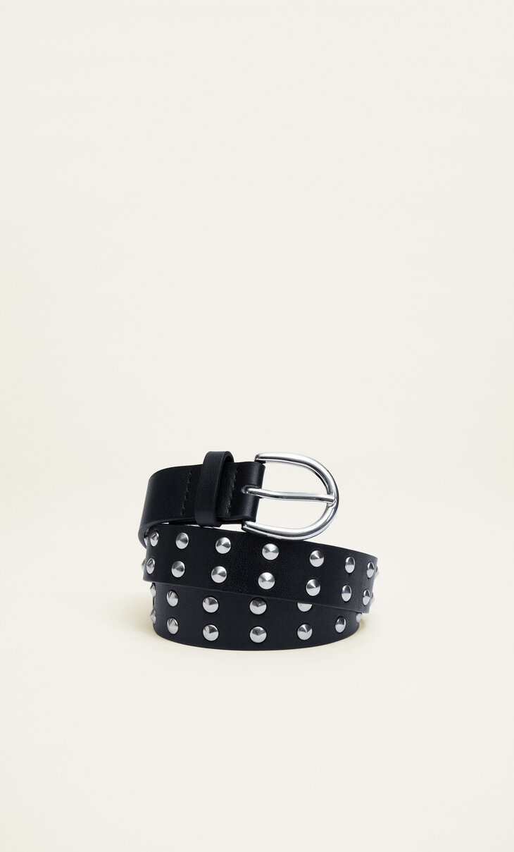 Belt with conical studs