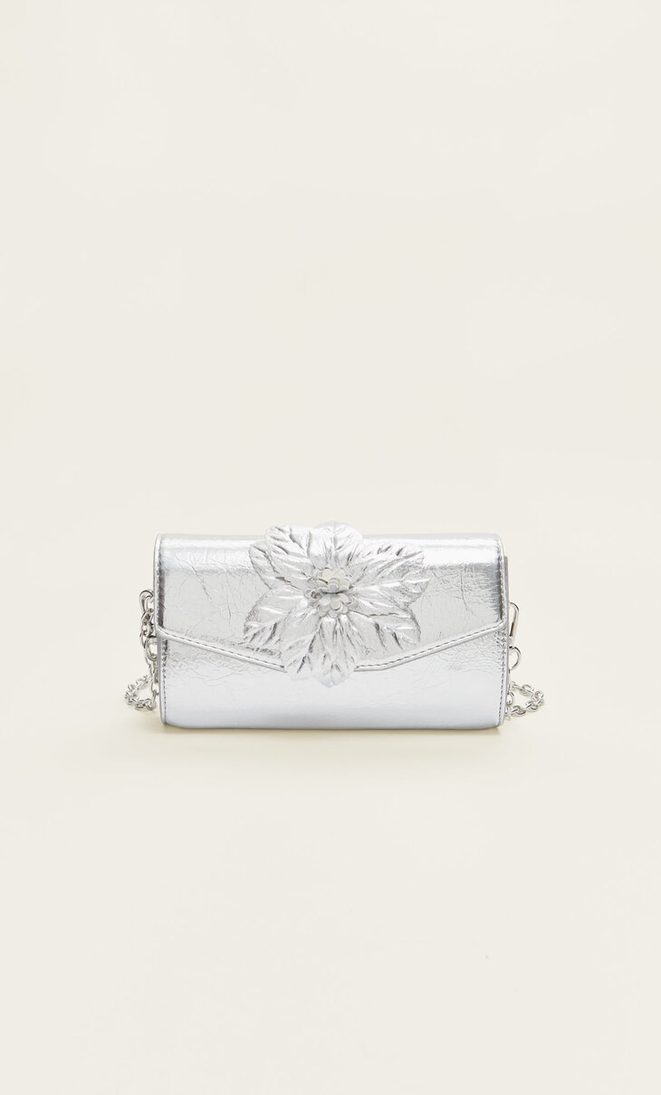 Faux leather mini clutch with flower detail