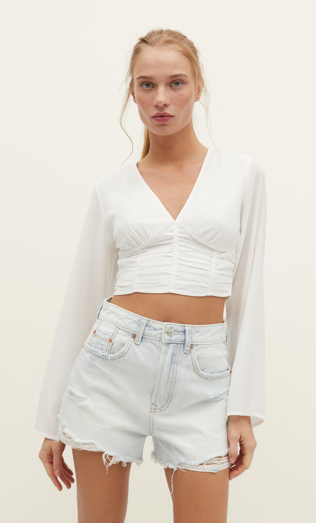 

Stradivarius Spodenki jeansowe z przetarciami Denimowy średni Light Blue 38